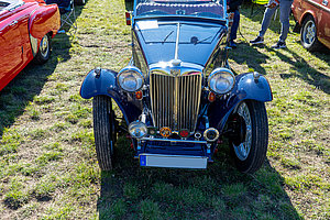 MG